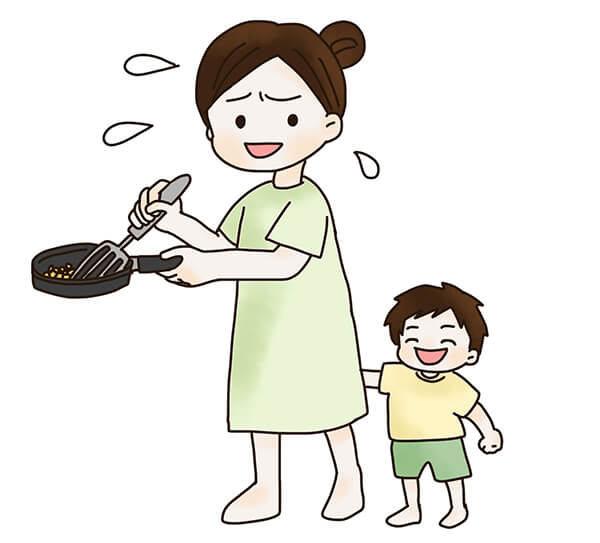 急いで子供のご飯を作るお母さんのイラスト