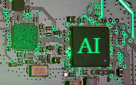 AIと書かれた文字と、ACチップを背景にした画像